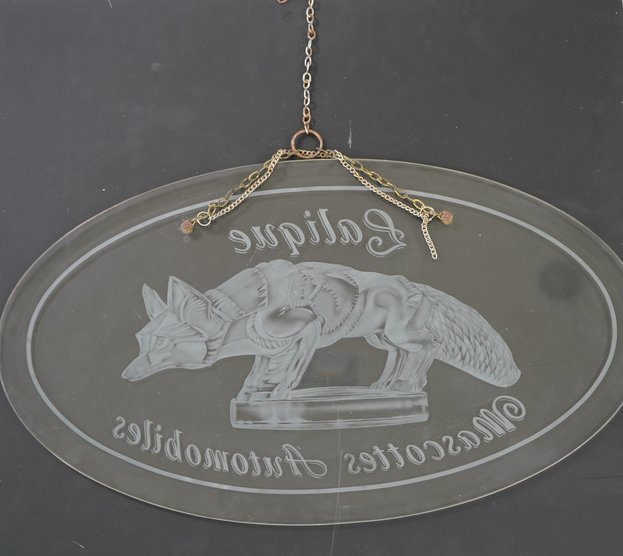 A rare boutique advertising hanging glass sign for Lalique